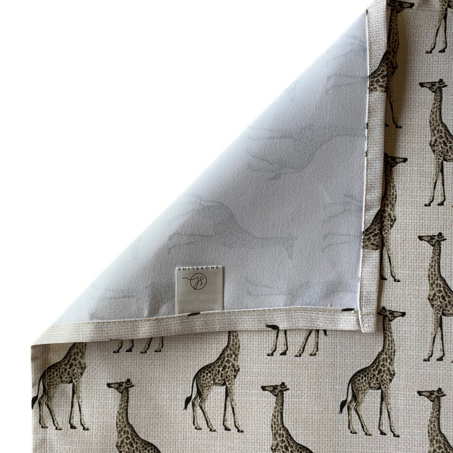 Fabric with giraffe pattern on a white background