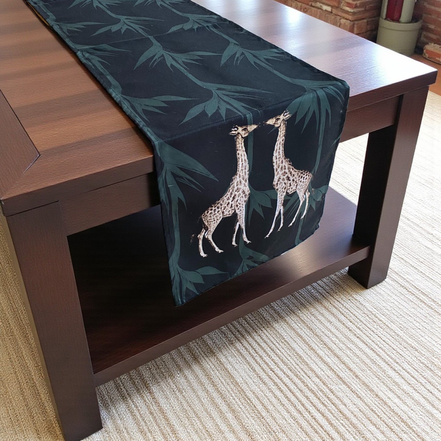 Table runner with giraffe design on a wooden table