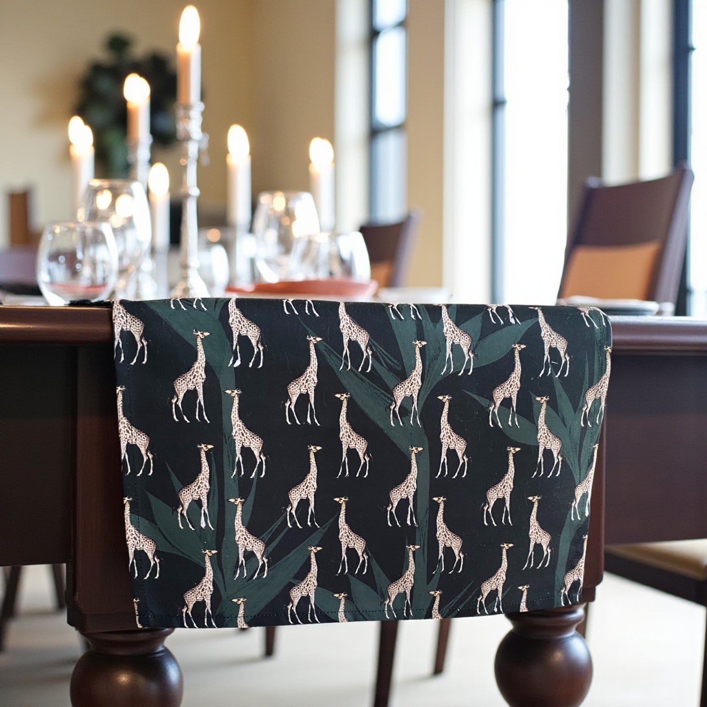 Table with giraffe patterned fabric runner in a dining room setting